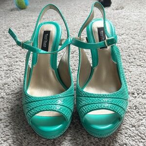 Never worn White House Black Market. Teal green slingbacks.